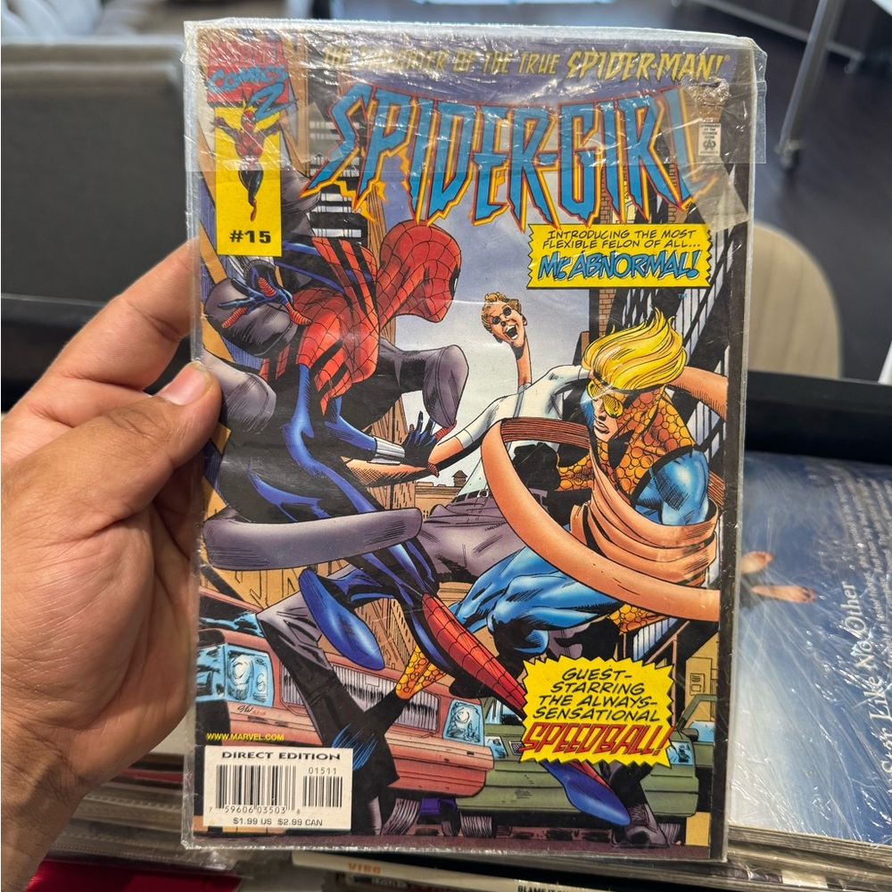 Marvel Spider-Girl Comic with Red and Blue Cover